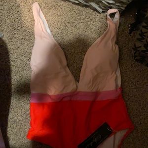 Swim suite from Closet Candy. Was bought last spring runs small.